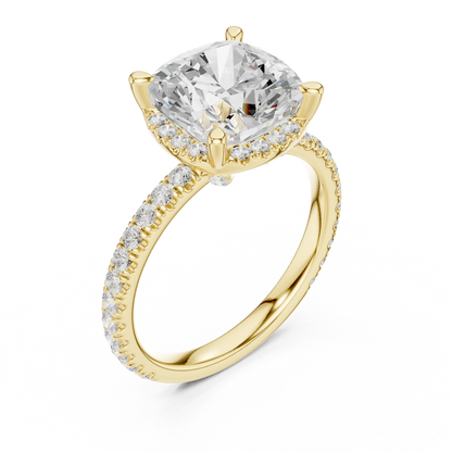Front view of yellow gold cushion cut solitaire ring with hidden halo and thin pav茅 diamond band and lab-created diamond