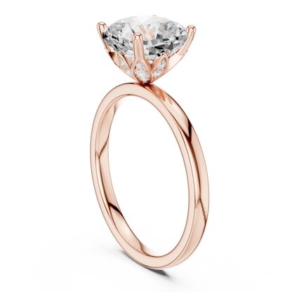 Back side view of rose gold cushion cut solitaire ring showing band and setting details