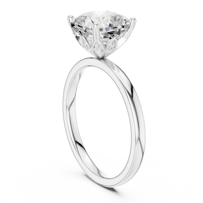 Back side view of white gold cushion cut solitaire ring showing band and setting details
