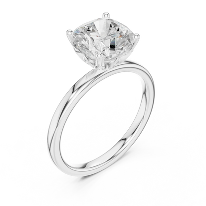 Front view of white gold cushion cut solitaire ring with domed band and center stone