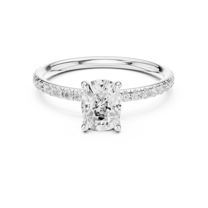 Lab-grown cushion cut solitaire ring in white gold with thin pavé diamond band