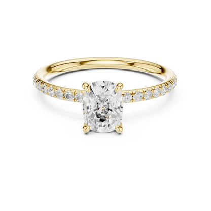Lab-grown cushion cut solitaire ring in yellow gold with thin pavé diamond band