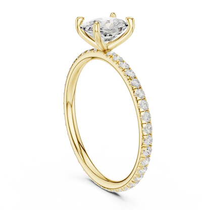 Back side view of yellow gold cushion cut solitaire ring showing pavé band and setting structure
