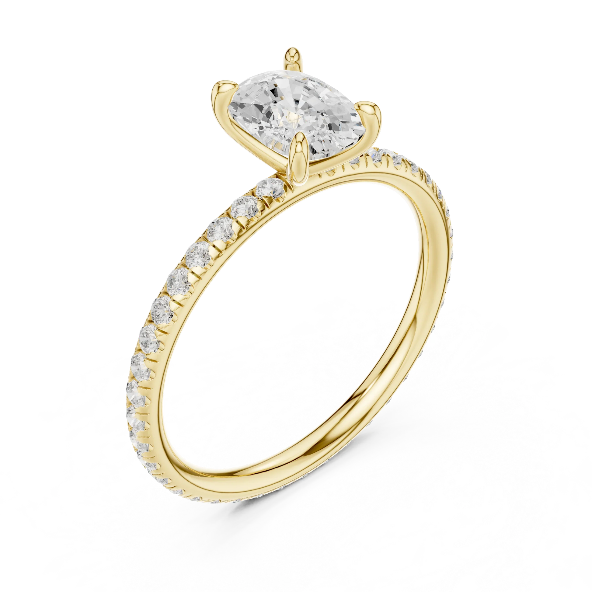 Front view of yellow gold cushion cut solitaire ring with thin pavé diamond band and center gemstone