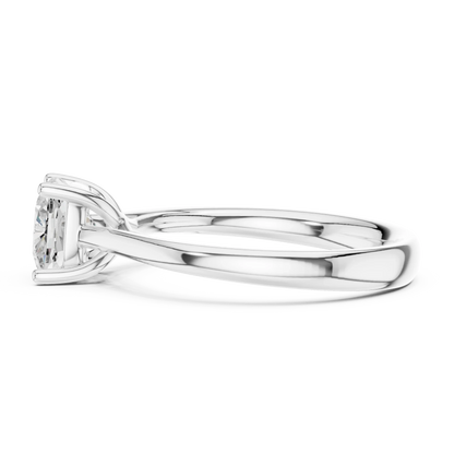 Side view of white gold cushion cut solitaire ring highlighting setting and band profile
