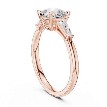 Rose gold cushion three-stone ring with tapered baguette side stones back view