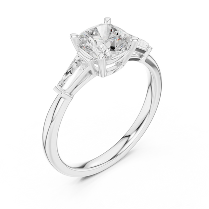 White gold cushion three-stone ring with tapered baguette side stones front view