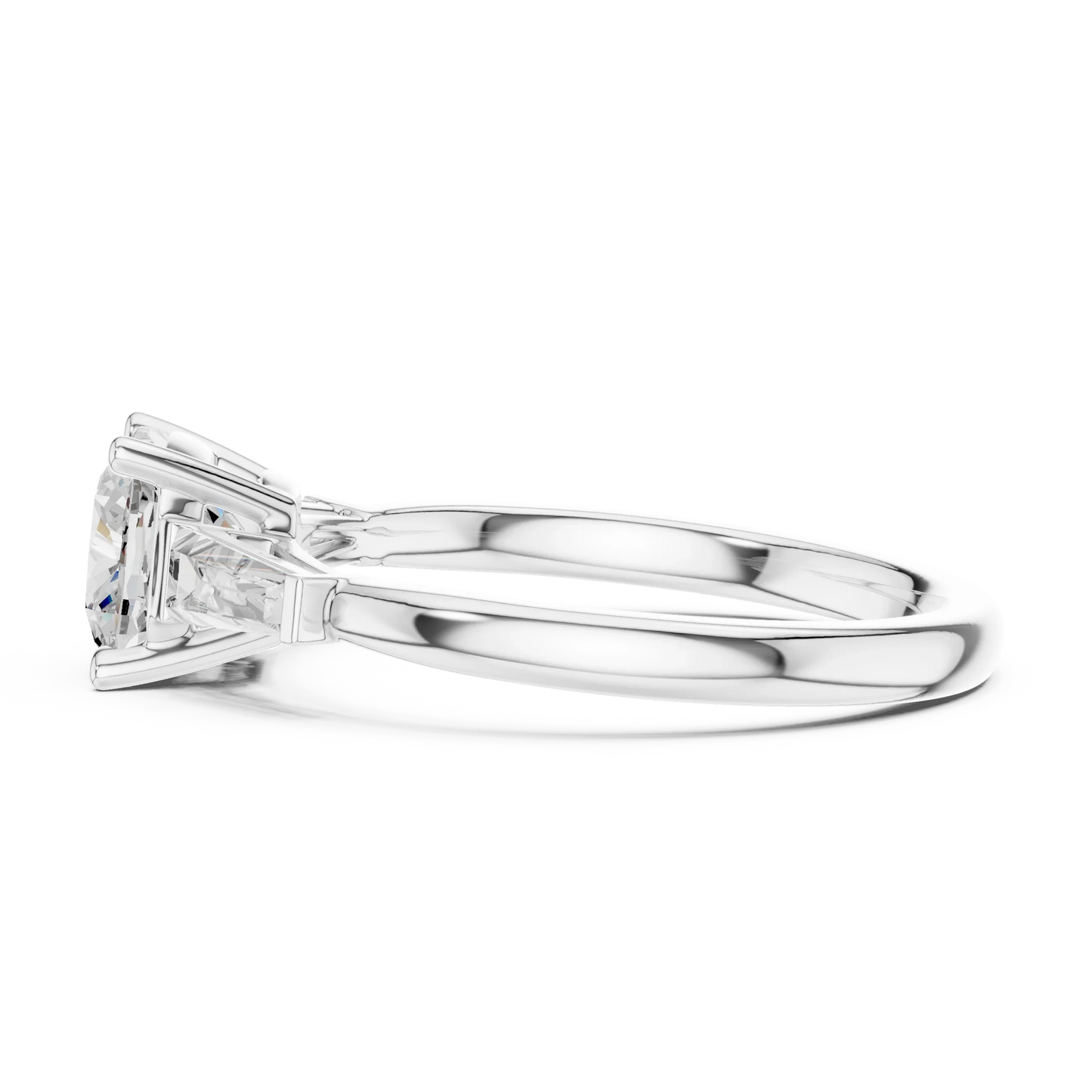 White gold cushion three-stone ring with tapered baguette side stones side view