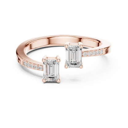 Double emerald open gap two stone ring with lab-grown emeralds and pavé band in rose gold with modern finish