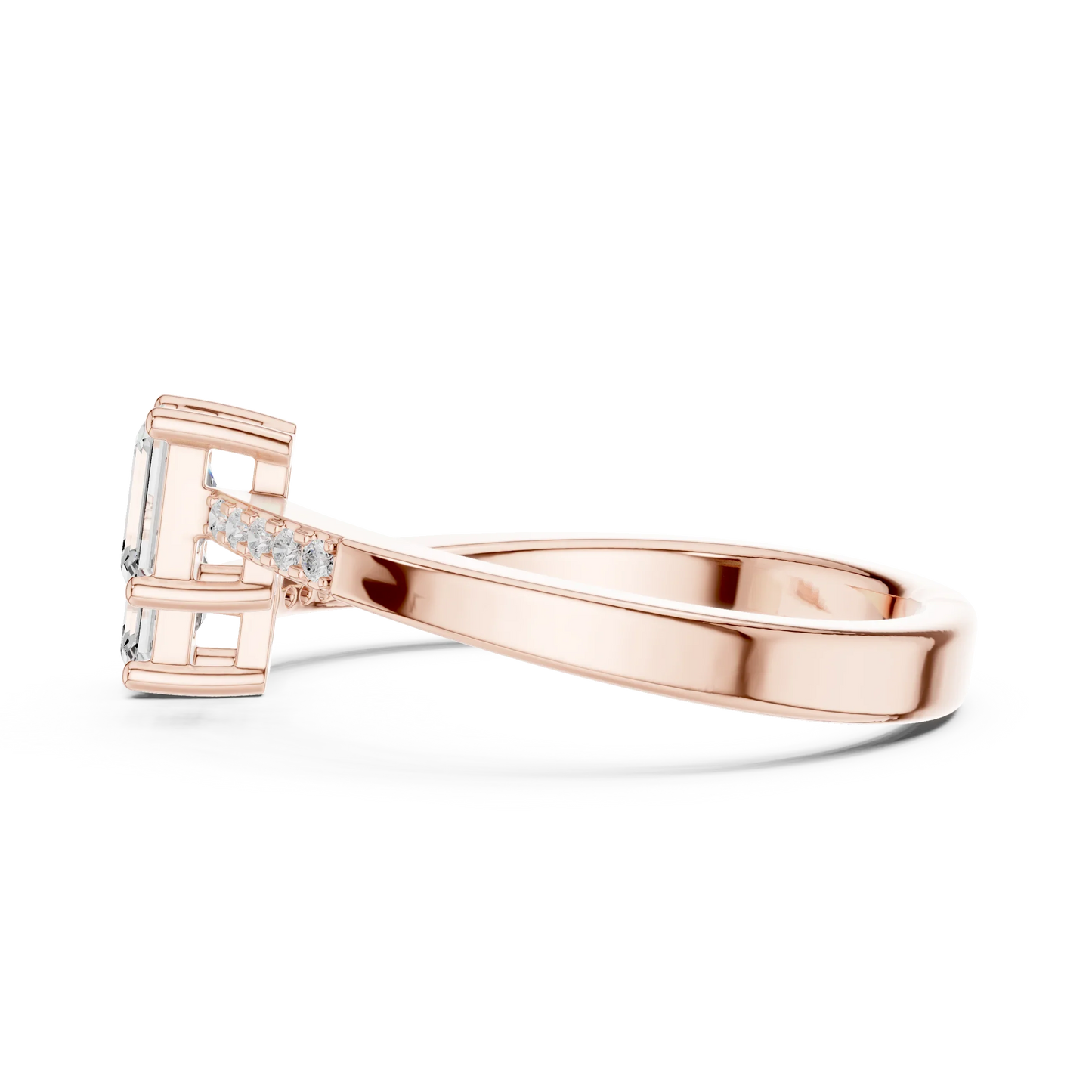 Side view of rose gold two stone ring highlighting double emerald setting and pavé band
