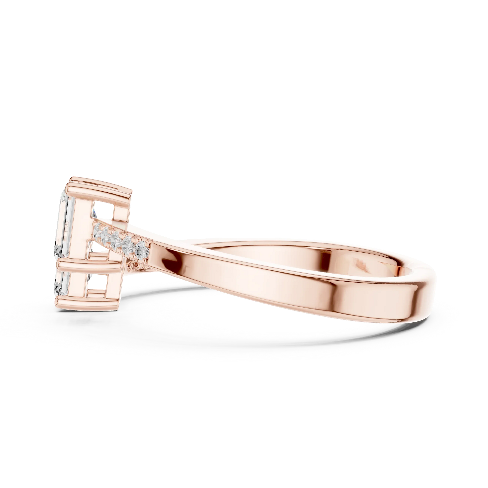 Side view of rose gold two stone ring highlighting double emerald setting and pavé band