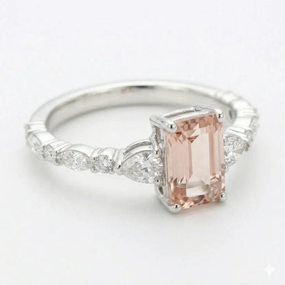Side view of white gold emerald cut center stone ring with trillion side stones and lab-grown diamonds – Australia