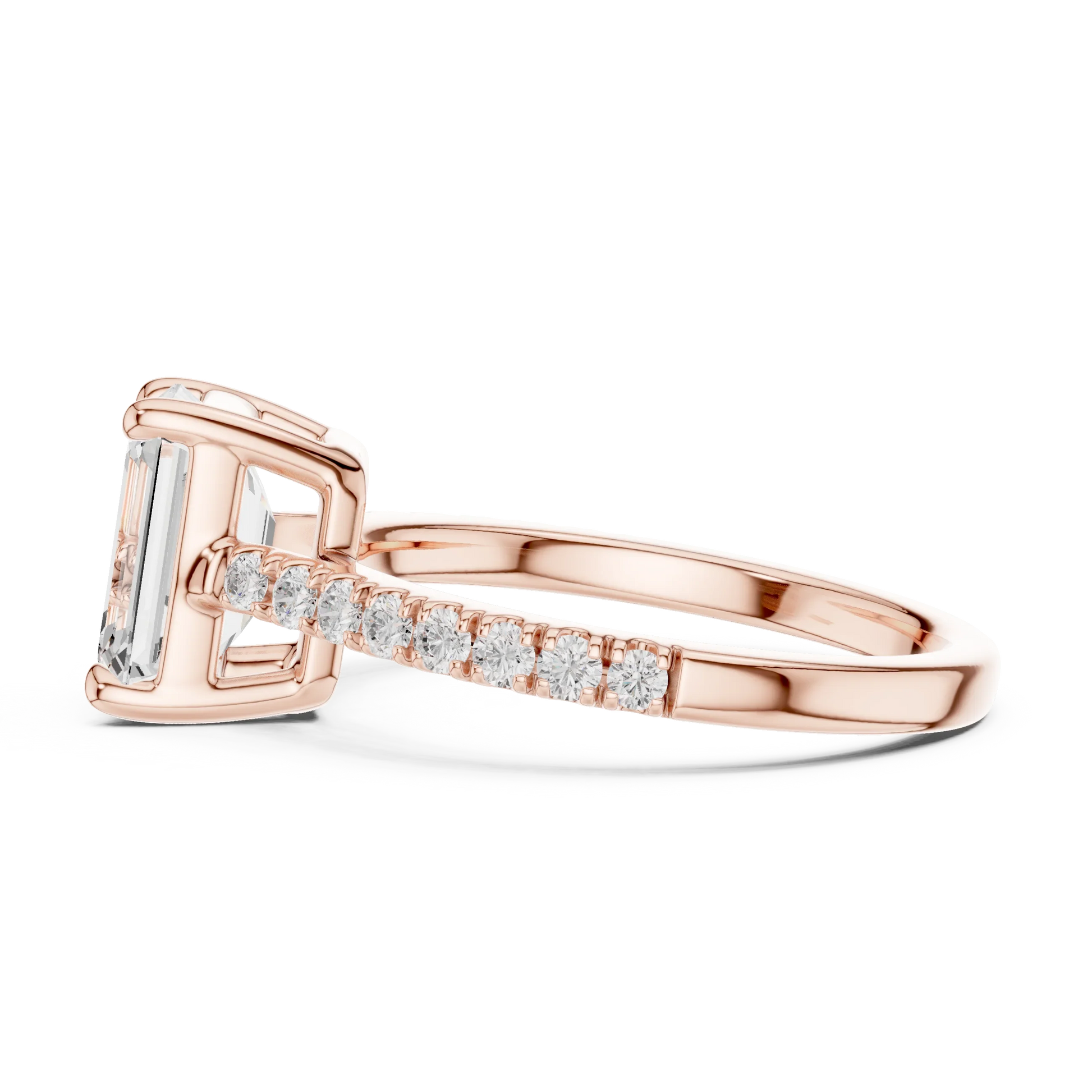 Side profile of rose gold emerald-cut diamond pavé band ring with detailed band setting