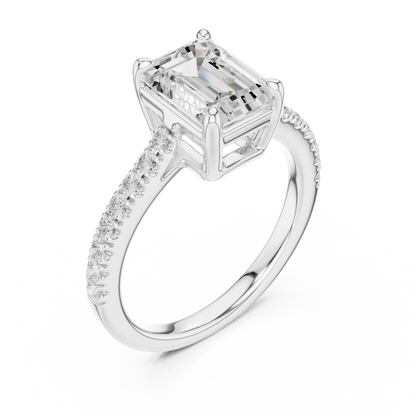 Front view of white gold emerald-cut diamond pavé band ring