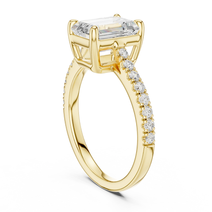 Back side view of yellow gold emerald-cut diamond pavé band ring showing band structure