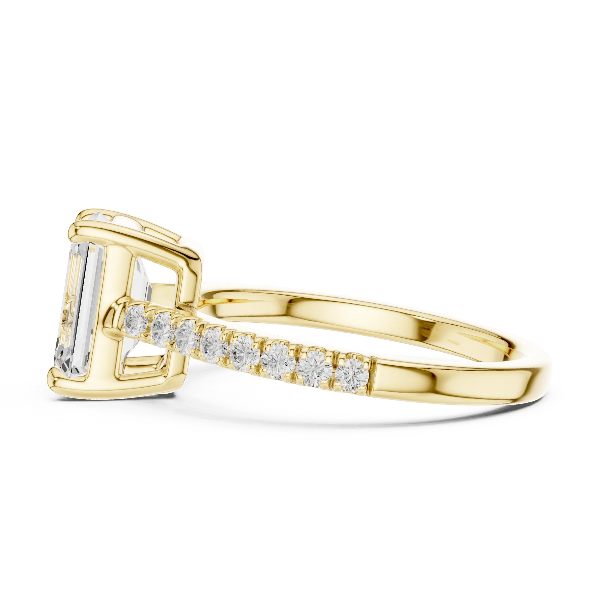 Side view of yellow gold emerald-cut diamond pavé band ring with detailed band setting