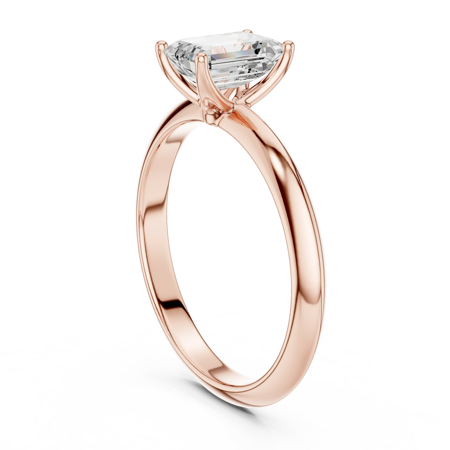 Back view of rose gold emerald diamond solitaire ring, showing band and setting detail
