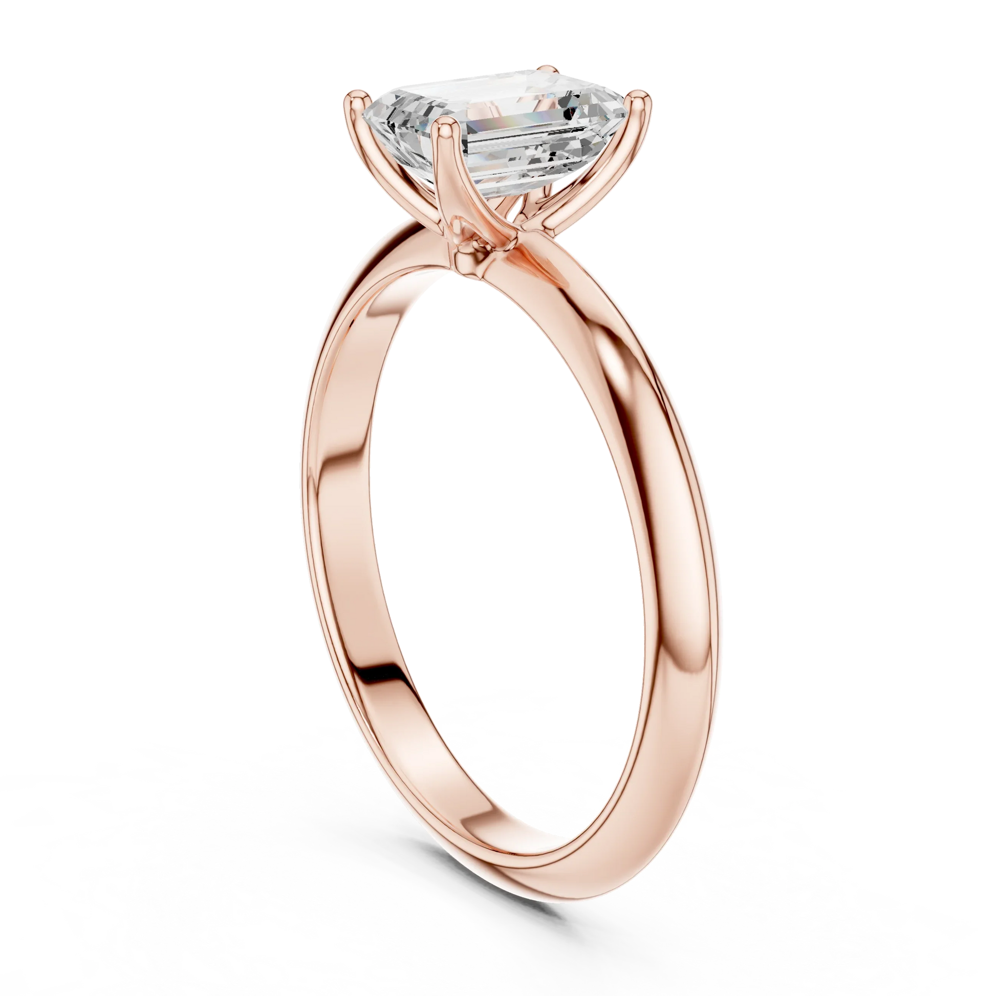 Back view of rose gold emerald diamond solitaire ring, showing band and setting detail