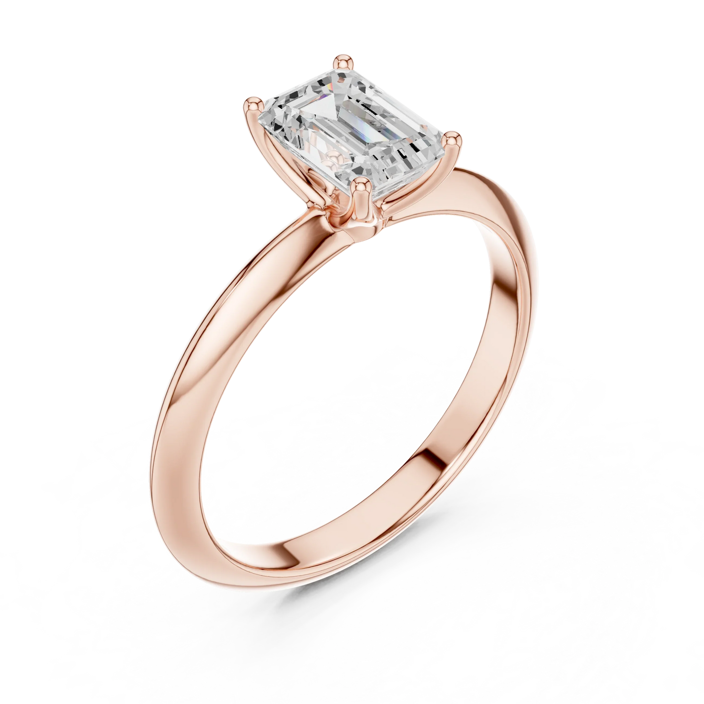 Front view of rose gold emerald diamond solitaire ring, showcasing gemstone brilliance.