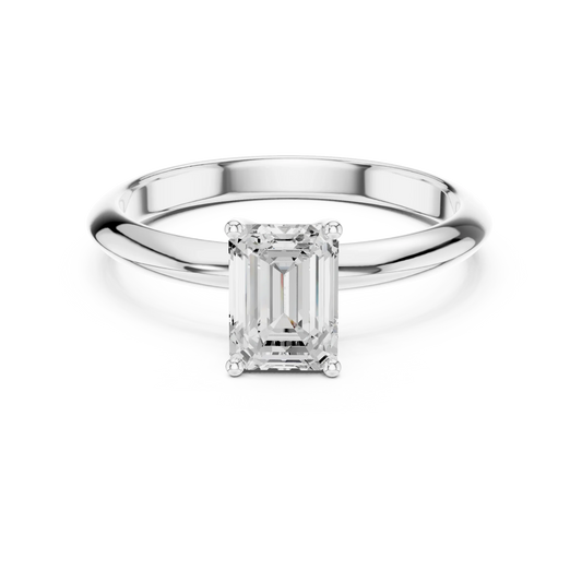 Lab-grown emerald cut diamond solitaire ring in white gold, elegant top view.