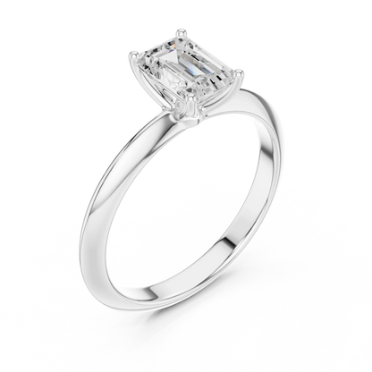 Front view of white gold emerald cut diamond solitaire ring, showcasing center stone