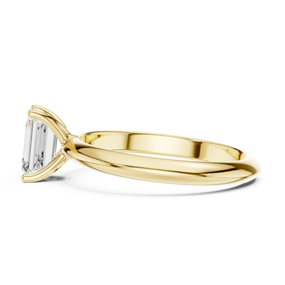 Side profile of yellow gold emerald cut diamond solitaire ring, highlighting stone height.