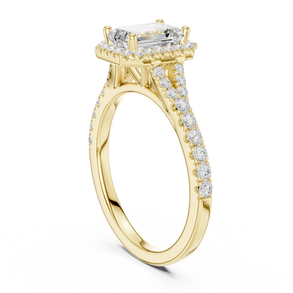 Back side view of yellow gold emerald halo ring showing pavé split shank band and setting structure