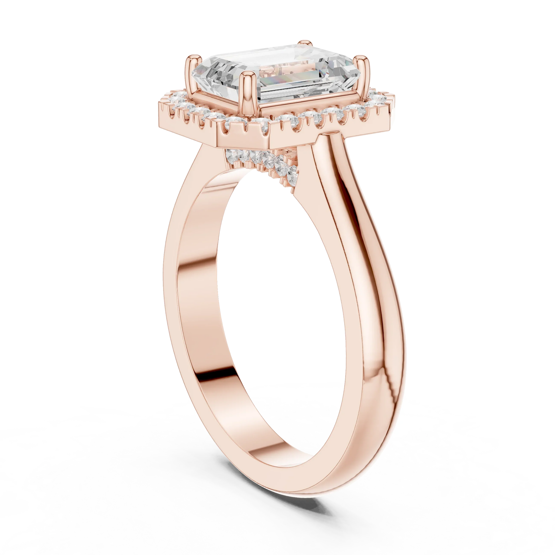 Back view of rose gold emerald halo ring with lab-grown diamond and polished band