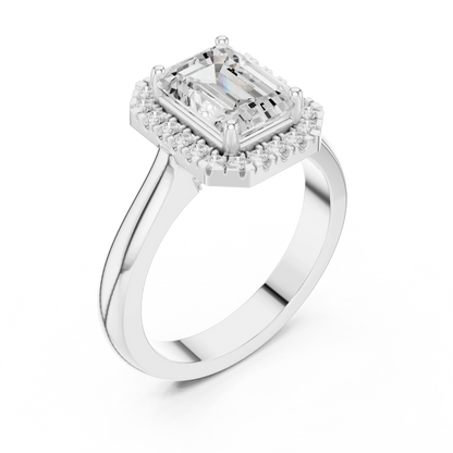 Front view of white gold emerald halo ring featuring lab-grown diamond with halo setting