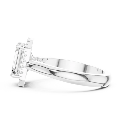 Side view of white gold emerald halo ring highlighting diamond setting and band profile
