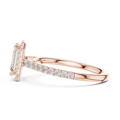 Side view of rose gold emerald-cut halo ring with pav茅 diamond band and lab-grown center stone