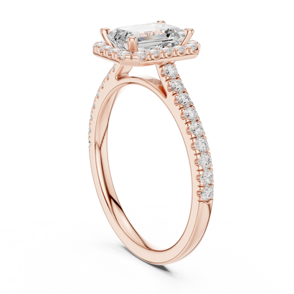 Top Side view of rose gold emerald-cut halo ring with pav茅 diamond band and lab-grown center stone