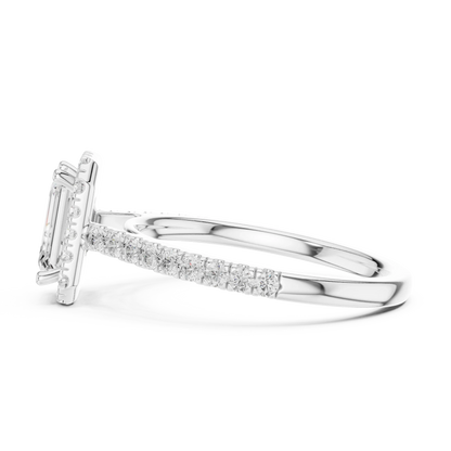 Side view of white gold emerald-cut halo ring with pav茅 diamond band and lab-grown center stone