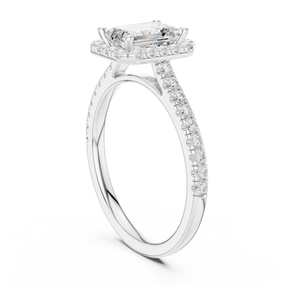 Top Side view of white gold emerald-cut halo ring with pav茅 diamond band and lab-grown center stone