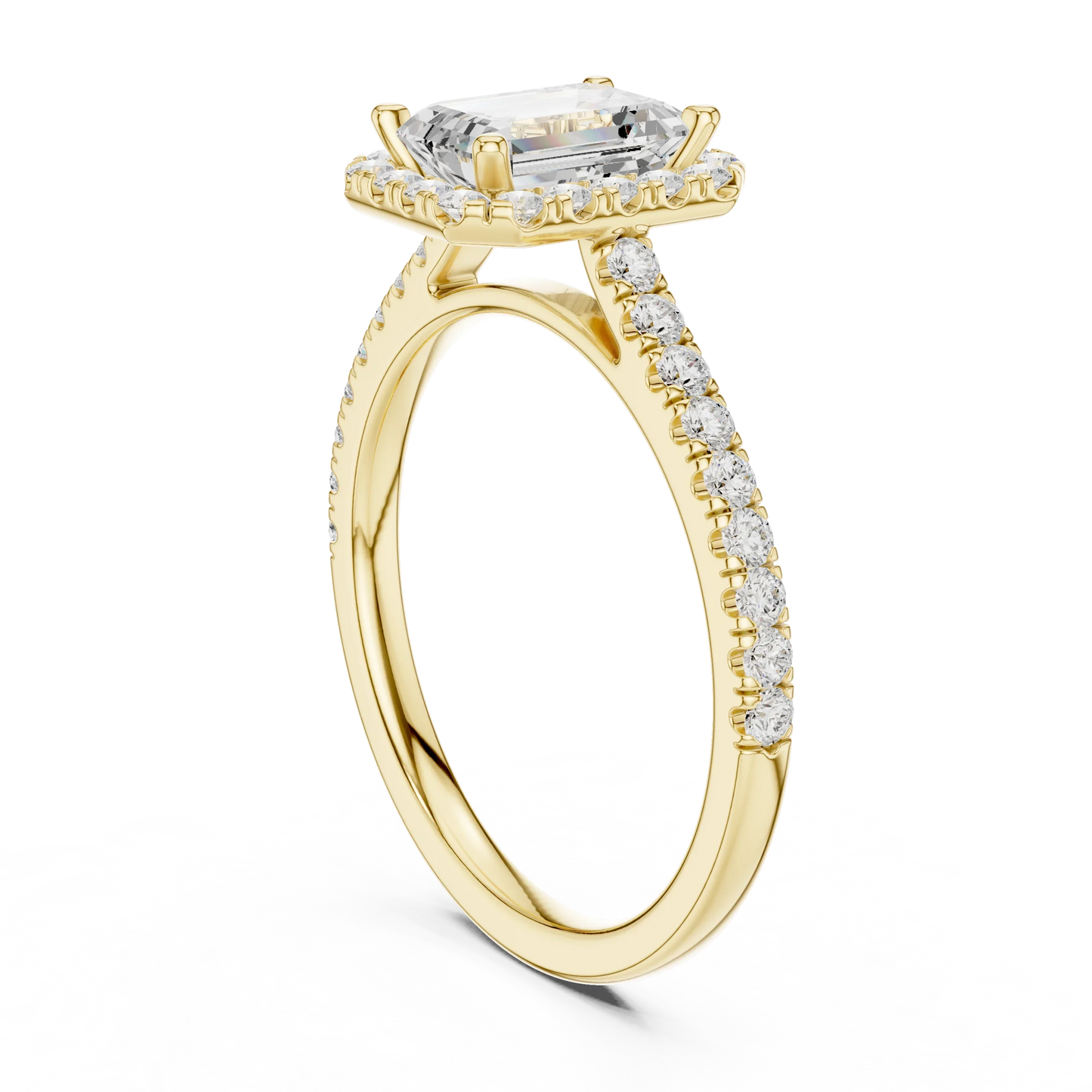 Top Side view of yellow gold emerald-cut halo ring with pav茅 diamond band and lab-grown center stone