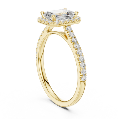 Top Side view of yellow gold emerald-cut halo ring with pav茅 diamond band and lab-grown center stone