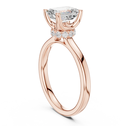 Back view of rose gold emerald solitaire ring with hidden halo and domed band and lab-grown diamond – Australia