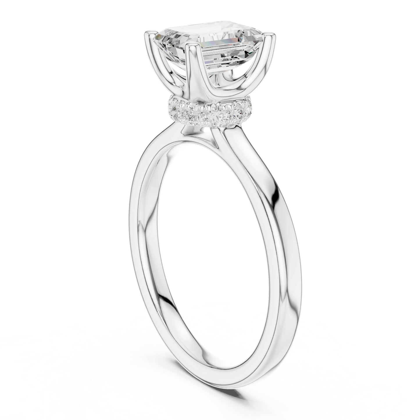 Back view of white gold emerald solitaire ring with hidden halo and domed band and lab-grown