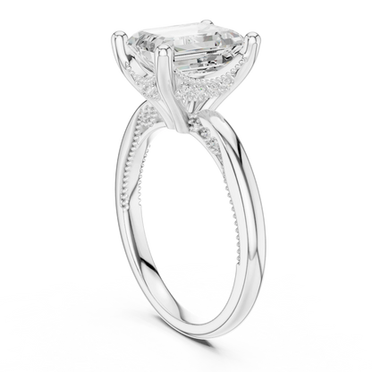Back side view of white gold emerald cut solitaire ring showing hidden halo and domed band details