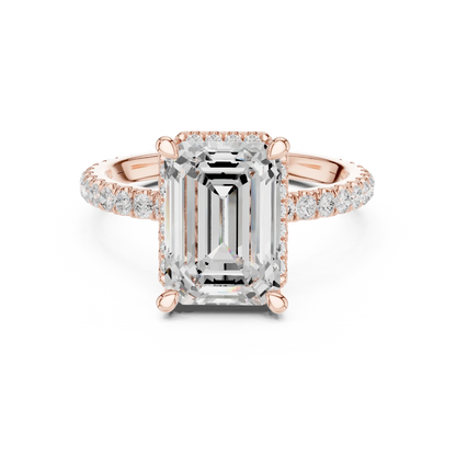 Rose gold emerald cut solitaire ring with hidden halo and thin pav茅 band featuring lab-grown diamond, modern delicate look