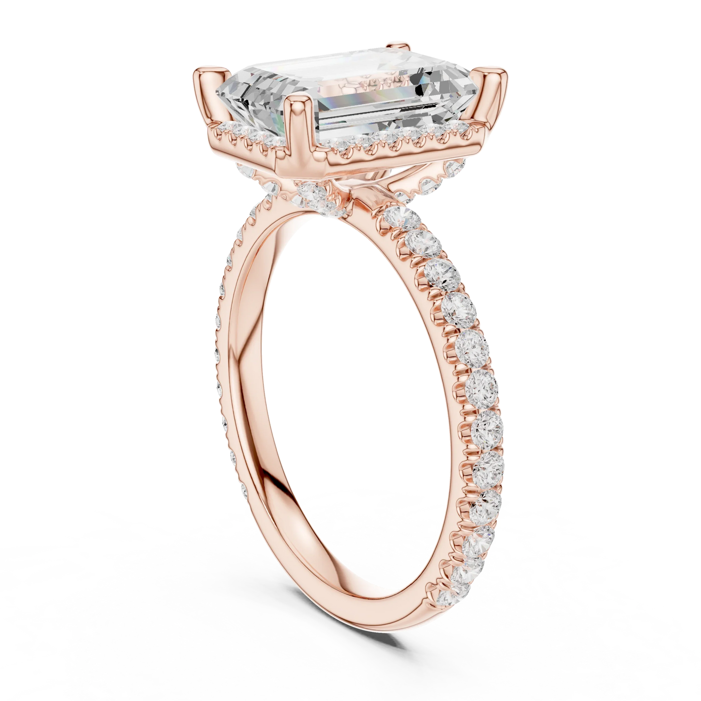 Back side view of rose gold emerald cut solitaire ring showing hidden halo and thin pav茅 band structure
