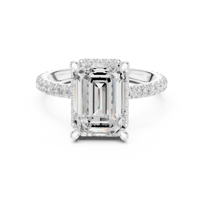 White gold emerald cut solitaire ring with hidden halo and thin pav茅 band featuring lab-grown diamond, elegant design