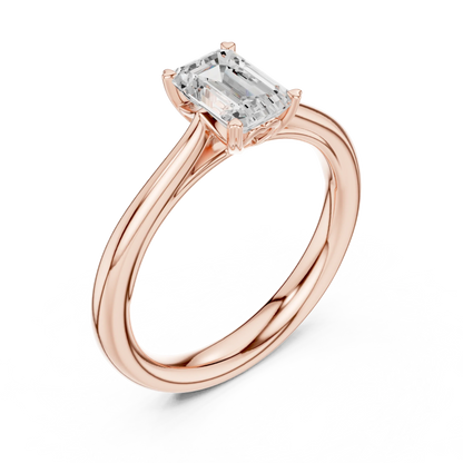 Front view of rose gold emerald solitaire ring showcasing lab-grown emerald gemstone shine