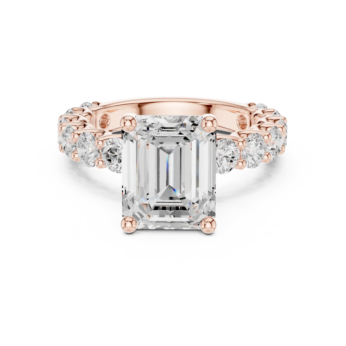Lab-grown emerald cut solitaire ring in rose gold with shared prong large stone band
