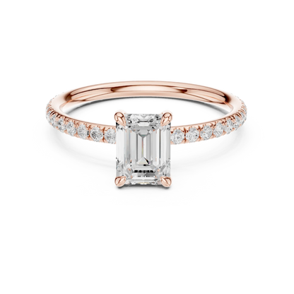 Lab-grown emerald cut solitaire ring in rose gold with thin pavé diamond band