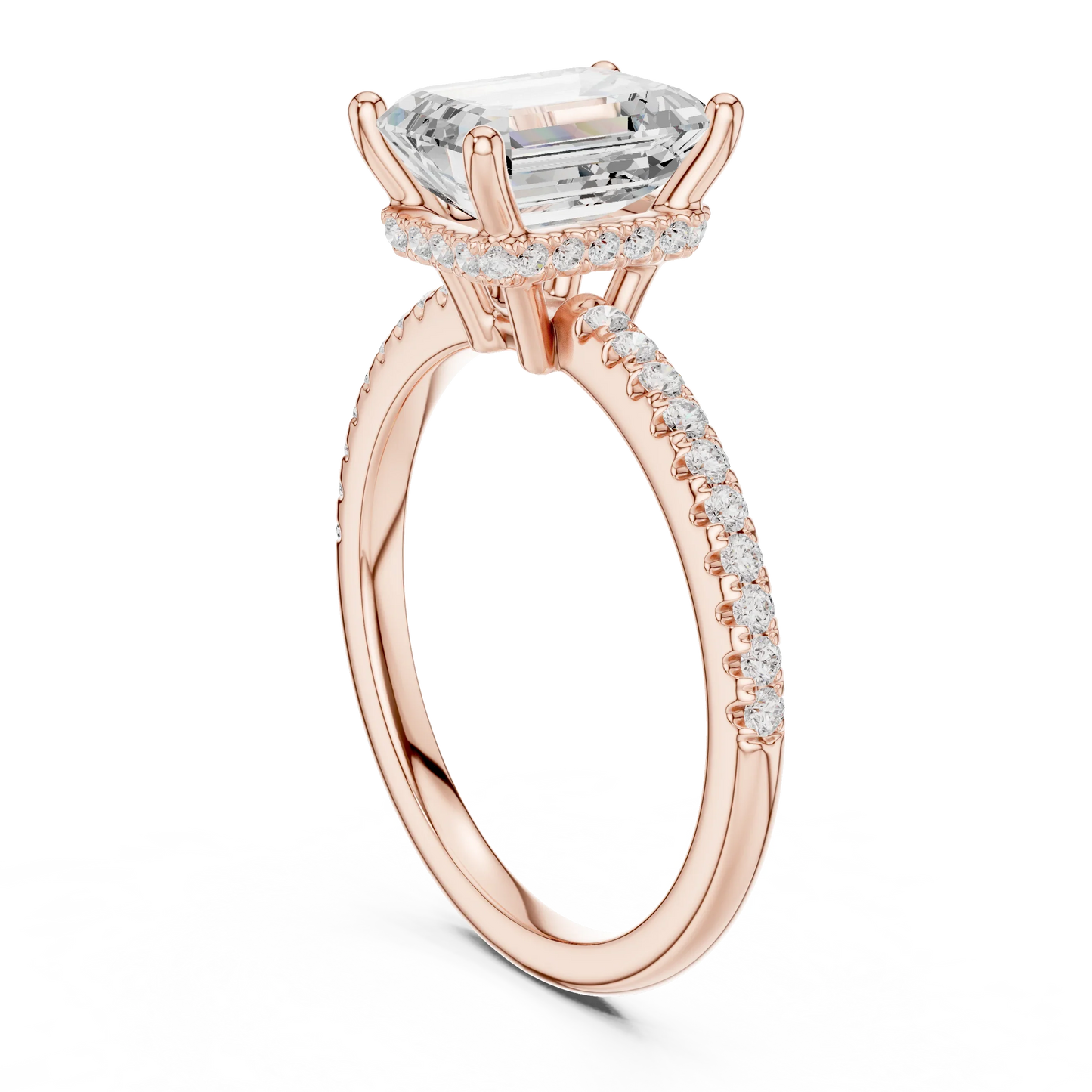 Back side view of rose gold emerald cut solitaire ring showing thin pave band and setting structure