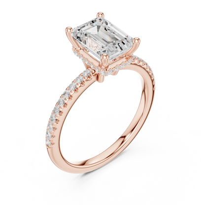 Front view of rose gold emerald cut solitaire ring with thin pave band and lab-created diamond