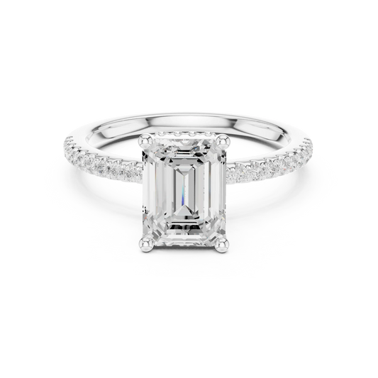 White gold emerald cut solitaire ring with thin pave band and lab-grown diamond, sleek elegant design
