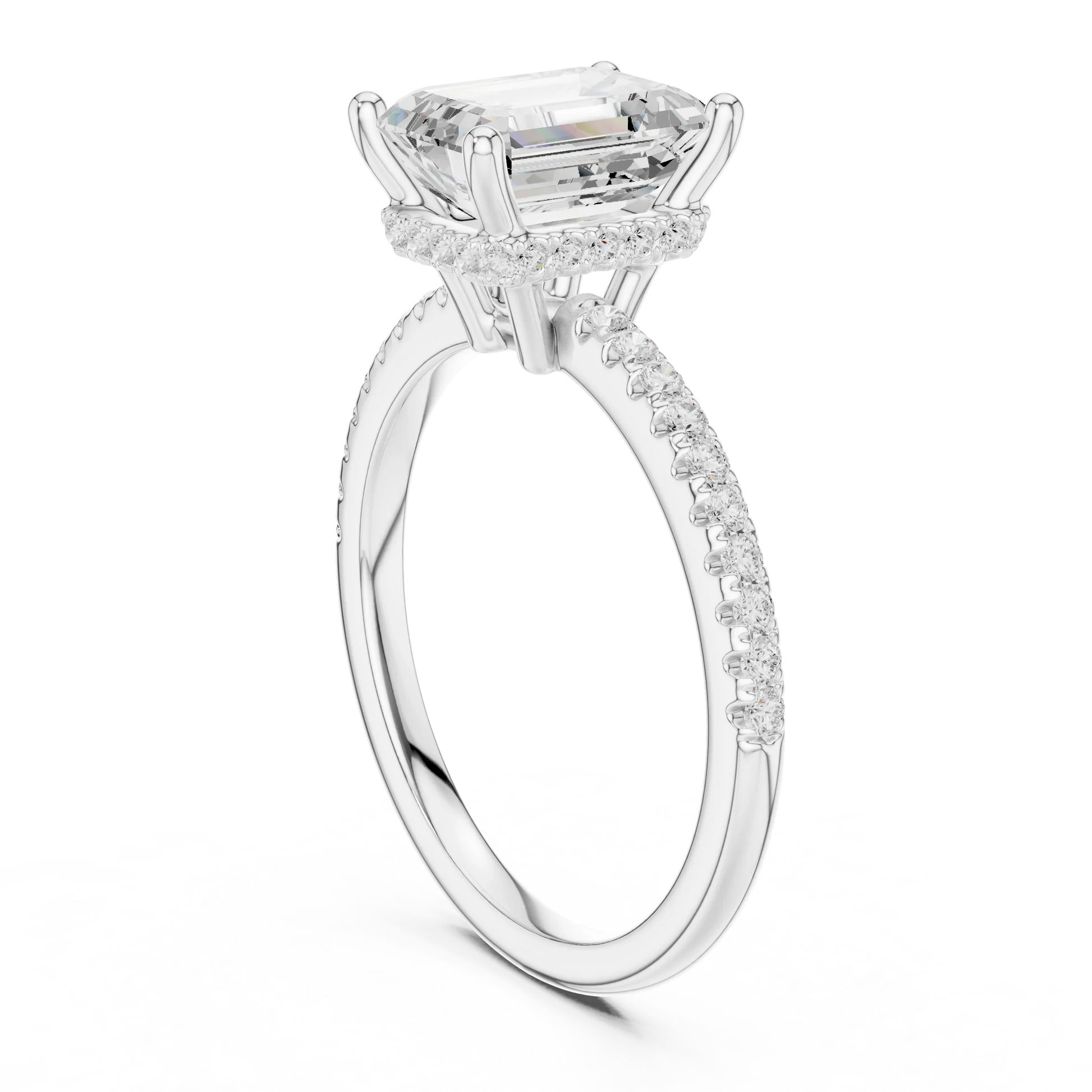 Back side view of white gold emerald cut solitaire ring showing thin pave band and setting details