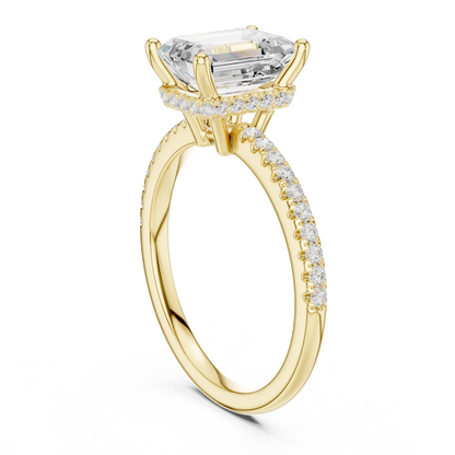 Back side view of yellow gold emerald cut solitaire ring showing thin pave band and mounting details